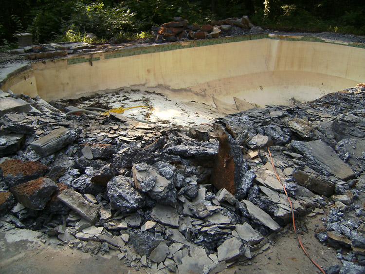 pool with concrete coping and deck removed